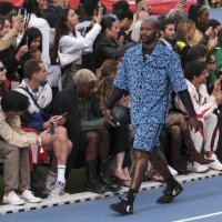 Footbaler Djibril Cissé walks the runway during the Marine Serre Menswear Spring Summer 2023 show as part of Paris Fashion Week on June 25, 2022 in...