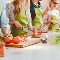 four people taking part in cooking class - food stock pictures, royalty-free photos & images