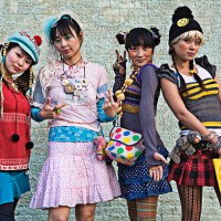 four women standing on sidewalk, portrait - fashion stock pictures, royalty-free photos & images