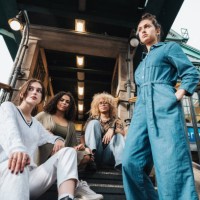 four young woman in berlin on stairs of subway station in berlin - fashion stock pictures, royalty-free photos & images