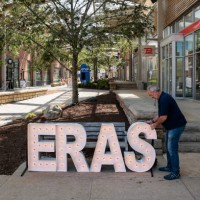 Foxborough, MA Joe Ackil, owner of Alpha-Lit, installs lighting for the Eras Taylor Swift tour in Patriot Place shopping mall.