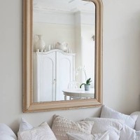 framed mirror above daybed with cushions - home decoration stock pictures, royalty-free photos & images