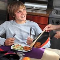 france, young boy eating - junk food stock pictures, royalty-free photos & images