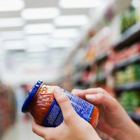 frau holding jar of food - food stock-fotos und bilder