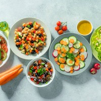 fresh and healthy salad plates shot from above - food stock pictures, royalty-free photos & images