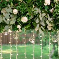 fresh floral garlands with stylish glass candlesticks - garden decoration stock pictures, royalty-free photos & images