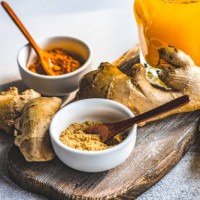 fresh turmeric, ginger and orange drink with ingredients on a table - food stock pictures, royalty-free photos & images