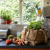 fresh vegetables in canvas bag on kitchen counter - food stock pictures, royalty-free photos & images
