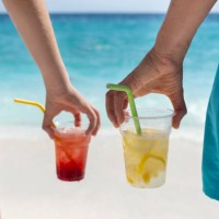 friends are sharing drinks on the beach - junk food stock pictures, royalty-free photos & images
