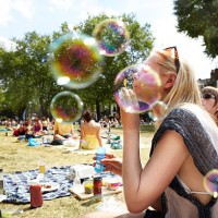 friends blowing bubbles in the park - food stock pictures, royalty-free photos & images