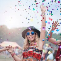 friends dancing among confetti at the music festival - concert stock pictures, royalty-free photos & images