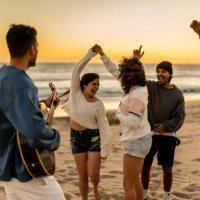 friends dancing and having fun on the beach - travel stock pictures, royalty-free photos & images