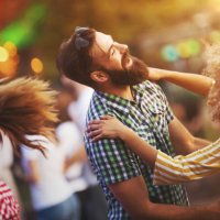 friends dancing at a concert. - concert stock pictures, royalty-free photos & images