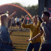 friends dancing at concert outside - concert stock pictures, royalty-free photos & images