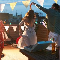 friends dancing at early evening party - garden decoration stock pictures, royalty-free photos & images