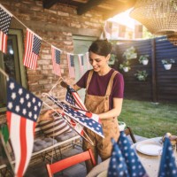 friends decorating backyard for celebration - garden decoration stock pictures, royalty-free photos & images