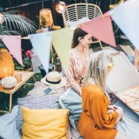 friends eating pizza and having a fun at the garden party. - junk food stock pictures, royalty-free photos & images