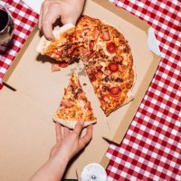 friends eating pizza at home - food stock pictures, royalty-free photos & images