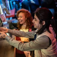 friends eating pizza outdoors at night - junk food stock pictures, royalty-free photos & images