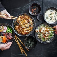 friends eating tradition japanese dishes - junk food stock pictures, royalty-free photos & images
