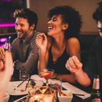 friends enjoying a meal - food stock pictures, royalty-free photos & images