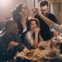 friends enjoying their favorite food place - junk food stock pictures, royalty-free photos & images