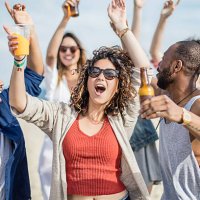 friends having fun on a party at the beach - concert stock pictures, royalty-free photos & images
