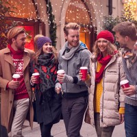 friends having fun outdoors in winter city. - junk food stock pictures, royalty-free photos & images