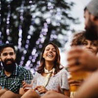 friends having some beers at a concert. - concert stock pictures, royalty-free photos & images