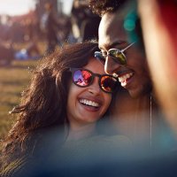 friends laughing at big festival - concert stock pictures, royalty-free photos & images