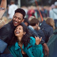 friends laughing together at outside concert - concert stock pictures, royalty-free photos & images