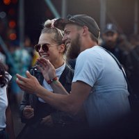 friends laughing together & clapping at concert - concert stock pictures, royalty-free photos & images