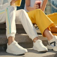 friends, legs and shoes on city steps for bonding, travel and urban break with drinks, smoothie and beverage, couple, people and town stairs for fashion, cool and trendy street style clothing - fashion stock pictures, royalty
