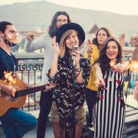 friends on the rooftop listening to a music band - concert stock pictures, royalty-free photos & images