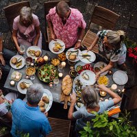 friends outdoors dining - food stock pictures, royalty-free photos & images