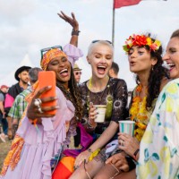 friends posing for selfies - concert stock pictures, royalty-free photos & images