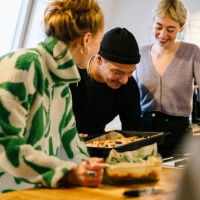 friends prepare food together - food stock pictures, royalty-free photos & images