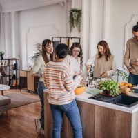 friends preparing a meal together - food stock pictures, royalty-free photos & images