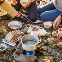 friends preparing breakfast at campsite - food stock pictures, royalty-free photos & images