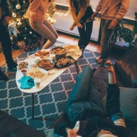 friends singing and having fun at christmas party - junk food stock pictures, royalty-free photos & images