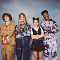 friends standing against colored background - fashion stock pictures, royalty-free photos & images