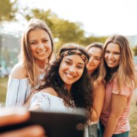 friends take a selfie in the park - concert stock pictures, royalty-free photos & images