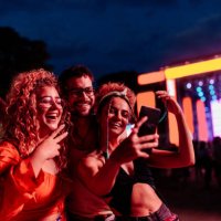 friends take selfie at a concert night. - concert stock pictures, royalty-free photos & images