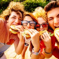 friends taking selfie with hamburgers - junk food stock pictures, royalty-free photos & images