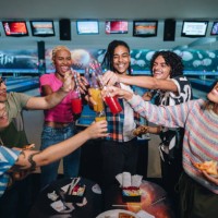 friends toasting at a bowling club - food stock pictures, royalty-free photos & images