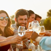 friends toasting at dinner party - food stock pictures, royalty-free photos & images