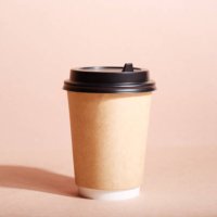 front view of eco friendly paper craft cup for coffee with black lid on the beige background. zero waste, plastic free concept. sustainable lifestyle. front view. - junk food stock pictures, royalty-free photos & images