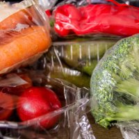 fruit and vegetables in plastic bags - food stock pictures, royalty-free photos & images