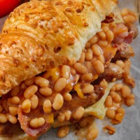 full english breakfast croissant sandwich - junk food stock pictures, royalty-free photos & images