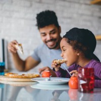 fun family mealtime - junk food stock pictures, royalty-free photos & images
